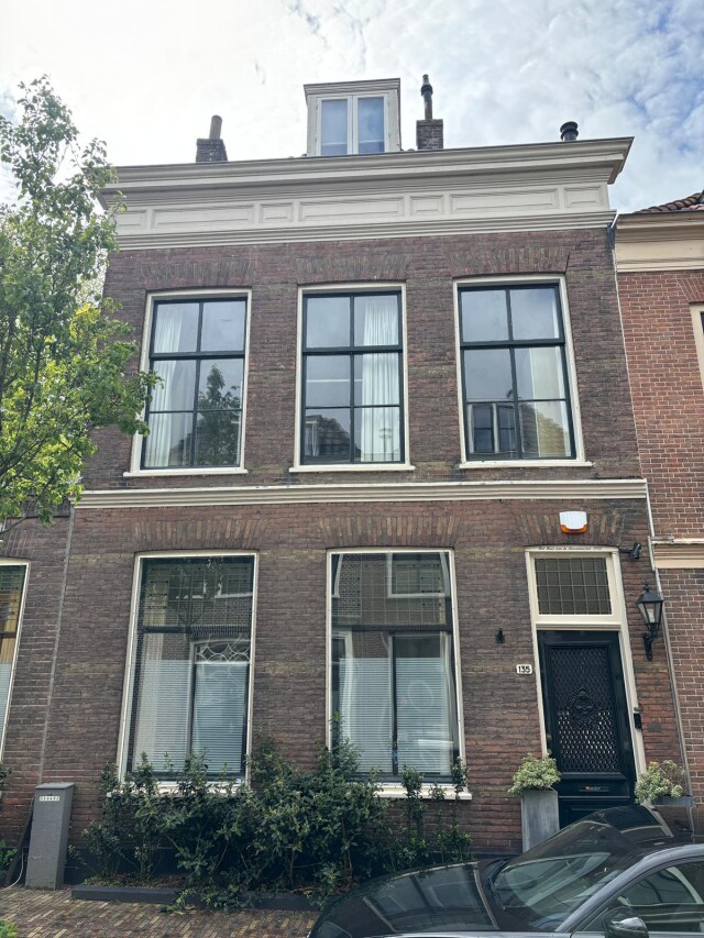 Herenhuis voorzien van nieuw glas
